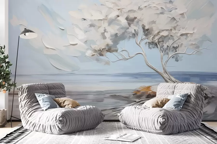 Fototapeta Białe drzewo z grubymi i teksturowanymi liśćmi na piaszczystej plaży, krajobraz z jasnoniebieskim niebem w09205