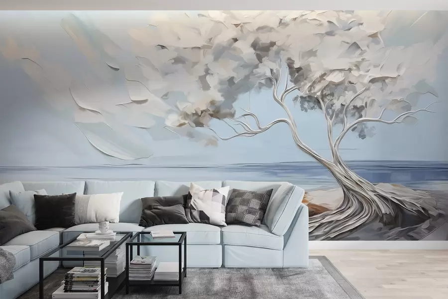 Fototapeta Białe drzewo z grubymi i teksturowanymi liśćmi na piaszczystej plaży, krajobraz z jasnoniebieskim niebem w09205