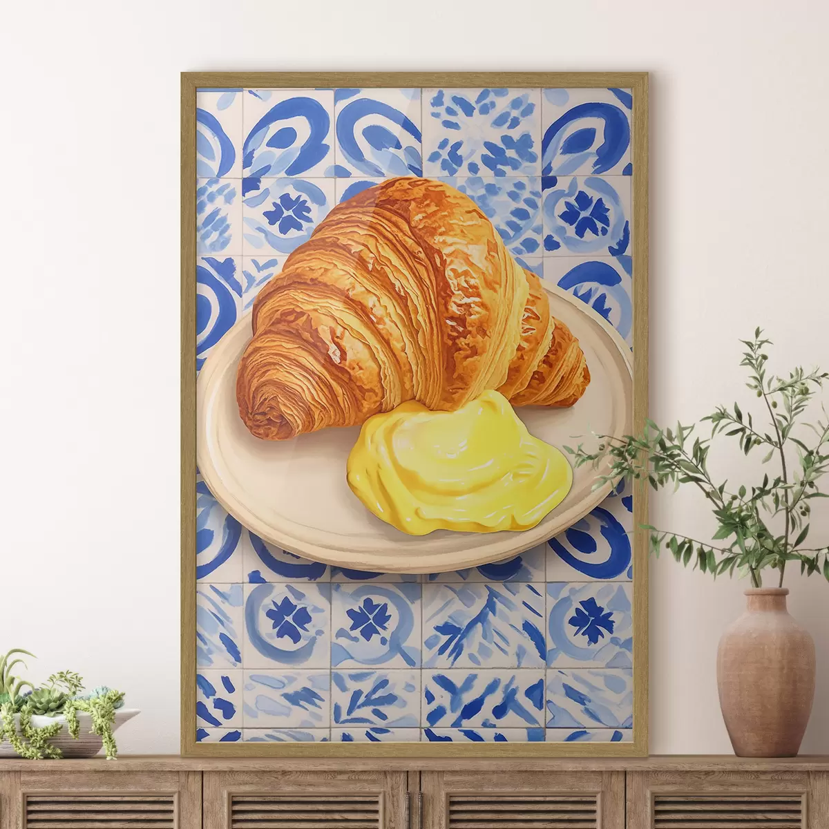 Plakat Croissant z masłem na talerzu f45146