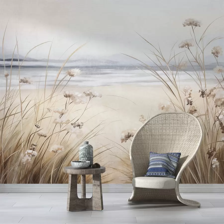 Fototapeta Pole pszenicy z białymi kwiatami na pierwszym planie, plaża i ocean w tle, neutralne pastelowe stonowane kolory w09298