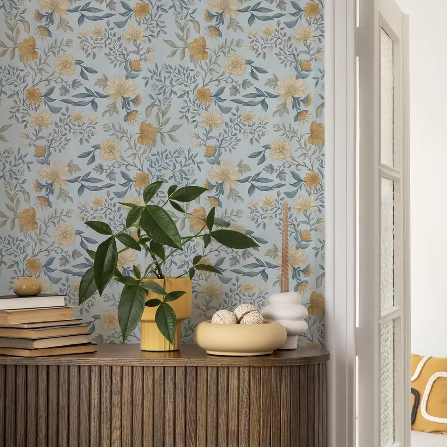 Fototapeta Żółte i niebieskie kwiaty z liśćmi na błękitnym tle a00934