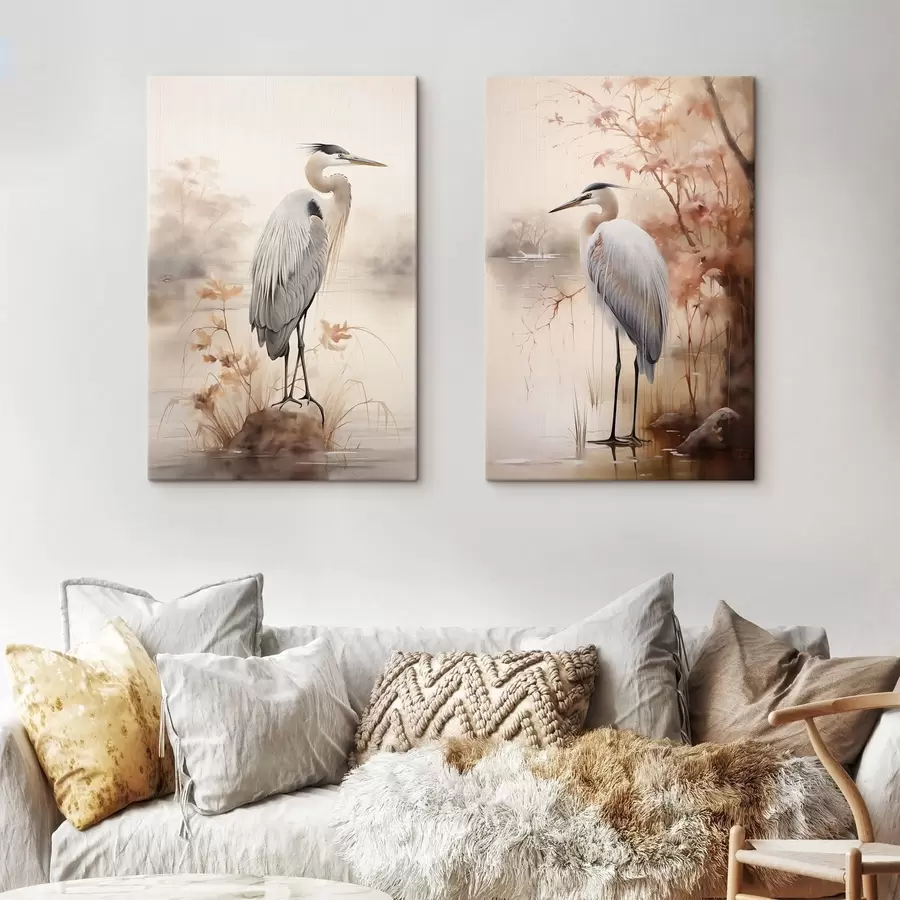 Obraz Czapla stoi na skale w jeziorze, a w tle widać wysokie trawy i drzewa. m01239