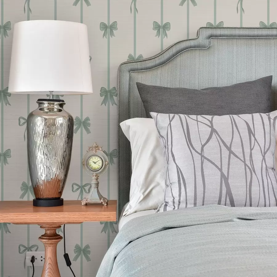 Fototapeta Zielone kokardki z wstążkami na beżowym tle a01074v1