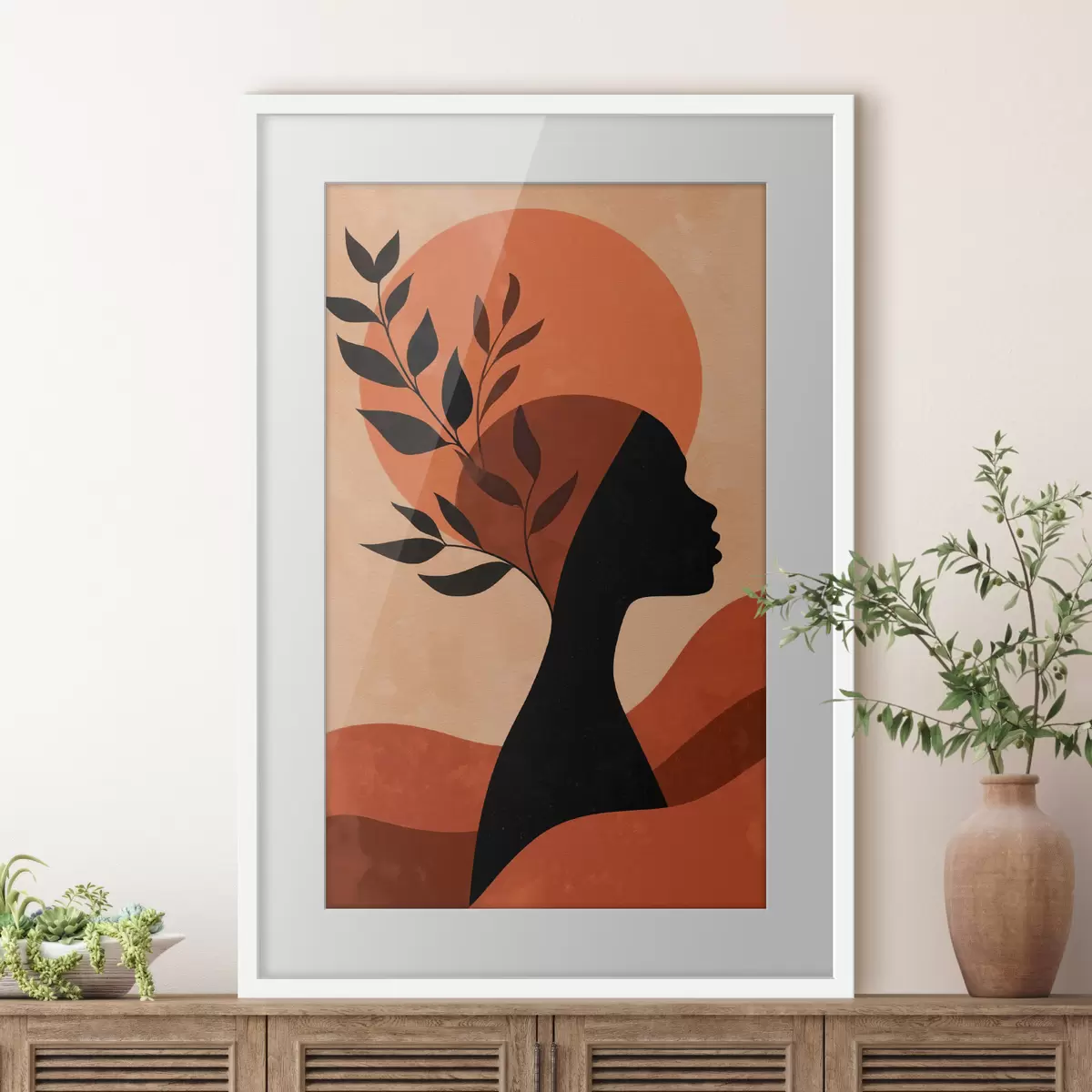 Plakat Sylwetka kobiety z liśćmi f49440